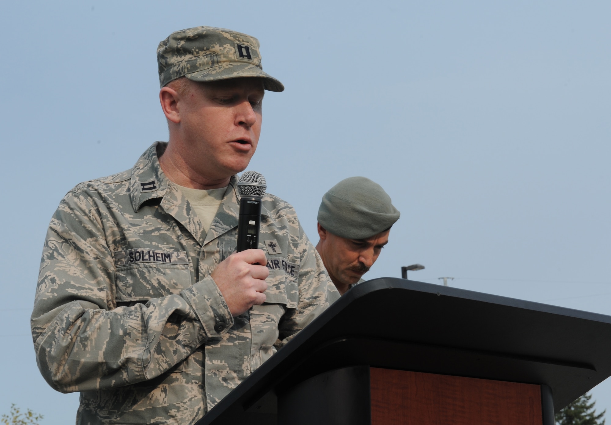 Chaplain (Capt.) Jeffrey Solheim, 92nd Air Refueling Wing, says a prayer during a Retreat Ceremony honoring prisoners of war and those missing in action at Fairchild Air Force Base, Wash. Sept. 21, 2012. This day is traditionally observed on the third Friday in September and is one of six days that Congress has mandated the flying of the National League of Families' POW/MIA flag. (U.S. Air Force photo by Staff Sgt. Michael Means)