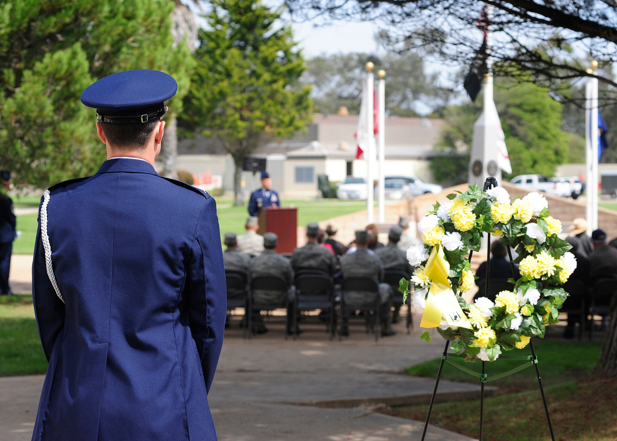 VANDENBERG AIR FORCE BASE, Calif. -- A Team V honor guard member watches over the honorary wreath which will be laid at the POW/MIA monument during a ceremony held here Friday, September 21, 2012. This annual ceremony held at Vandenberg's POW/MIA monument is dedicated to honoring our American prisoners of war and missing in action. (U.S. Air Force photo/Michael Peterson)