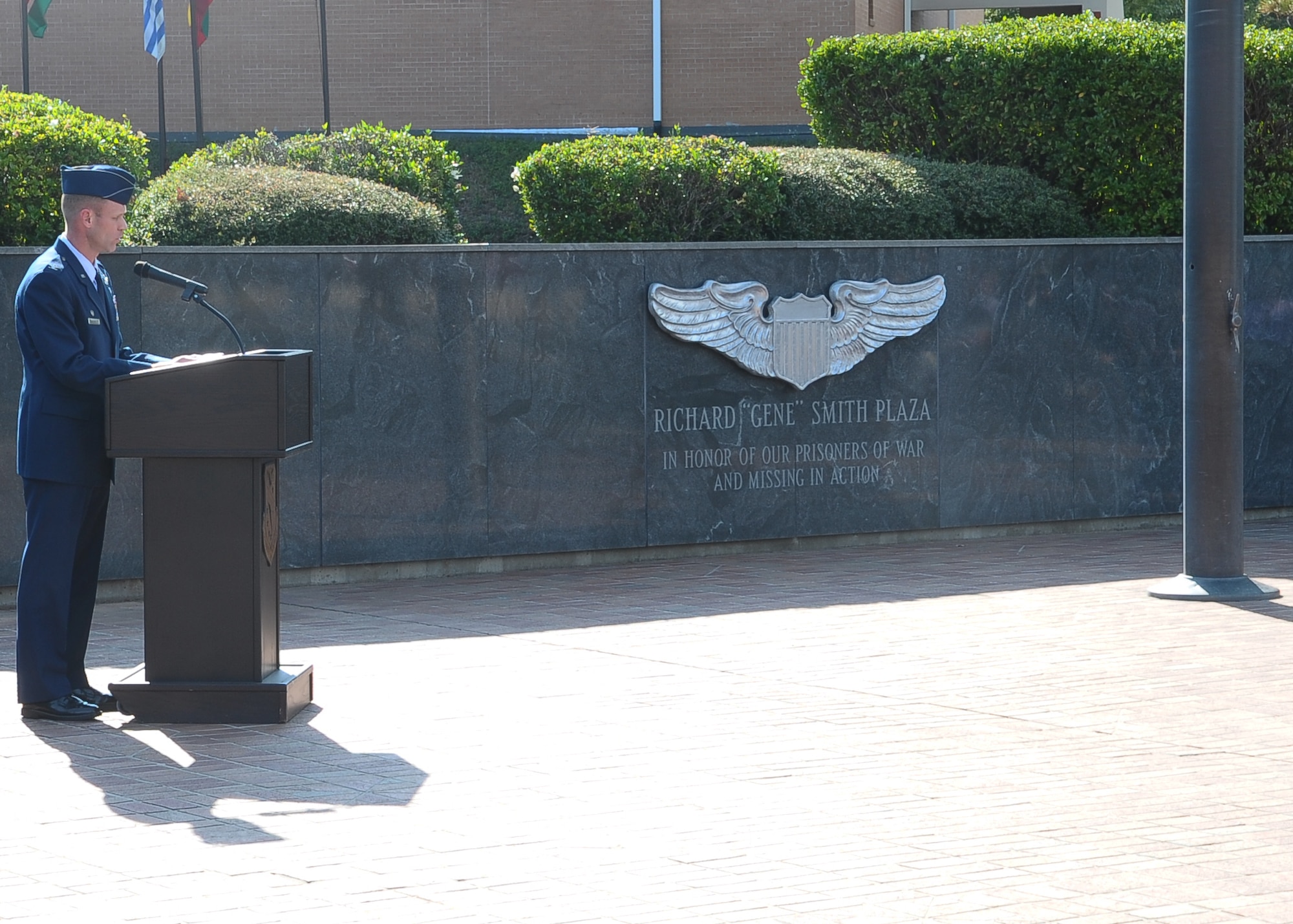 Col. Jim Sears, 14th Flying Training Wing Commander speaks to those in attendance at the Prisoner of War and Missing in Action Day retreat ceremony.  Sears recognized the two prisoners of war and the family members representing two other World War II POWs that were in attendance.  (U.S. Air Force Photo/Airman 1st Class Charles Dickens)