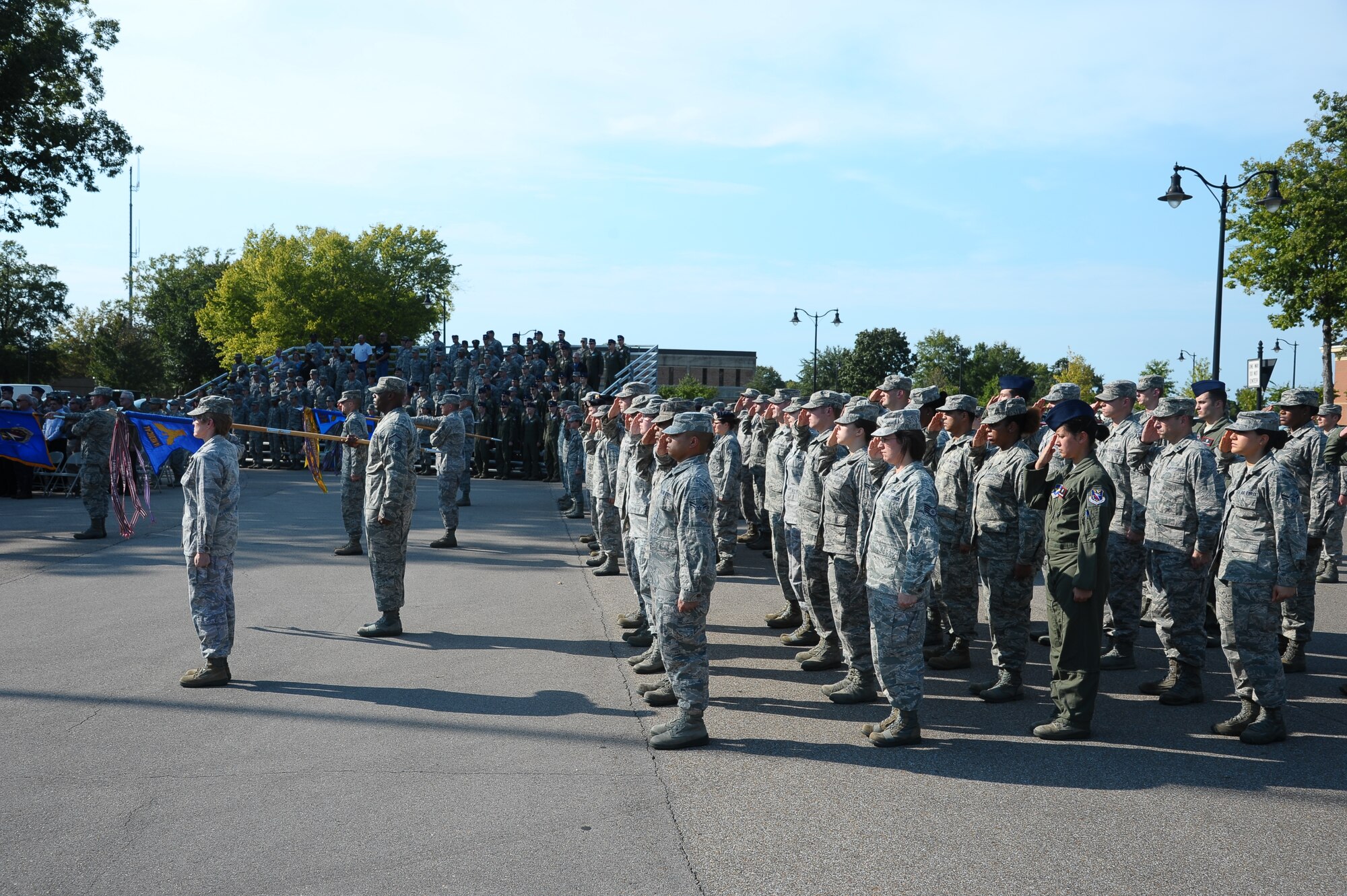 Members of the 14th Flying Training Wing salute the American Flag during the Prisoner of War and Missing in Action Day retreat ceremony Sept. 21 at Smith Plaza.  POW/MIA day is recognized as a day to remember the sacrifices made by those captured or missing in action to protect the freedoms of the United States of America.  (U.S. Air Force Photo/Airman 1st Class Charles Dickens)