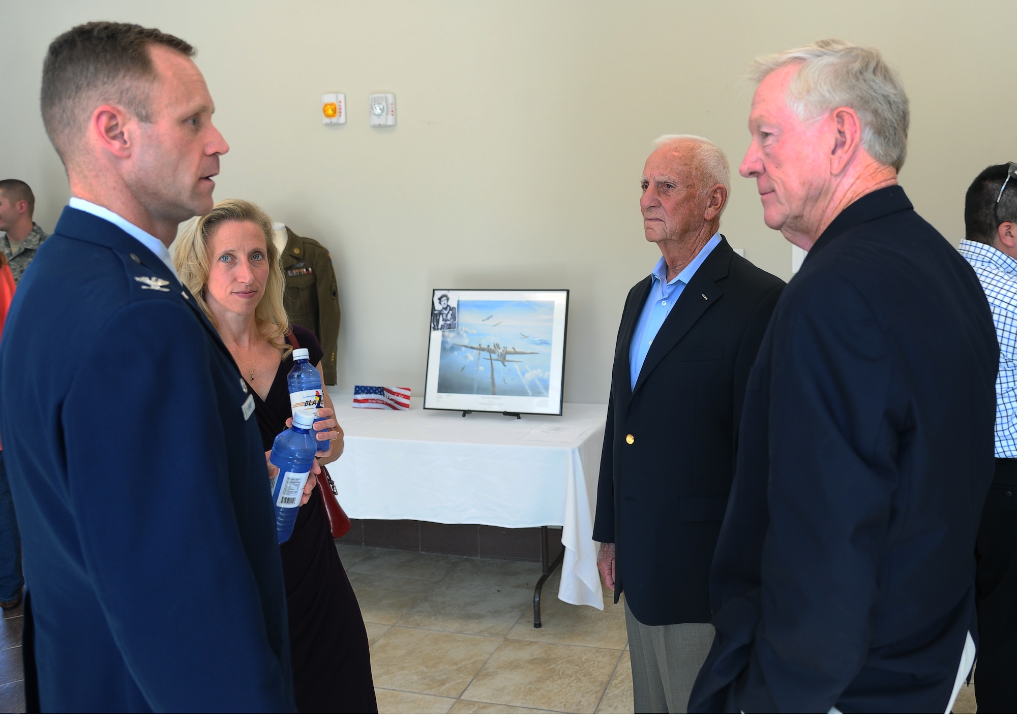 Col. Jim Sears, 14th Flying Training Wing Commander and Vikki Sears talk with two former prisoners of war, retired Lt. Col. Gene Smith and retired Col. Carlyle “Smitty” Harris.  Smith and Harris were both F-105 pilots that were shot down and became POWs in Vietnam.  (U.S. Air Force Photo/Senior Airman Chase Hedrick)
