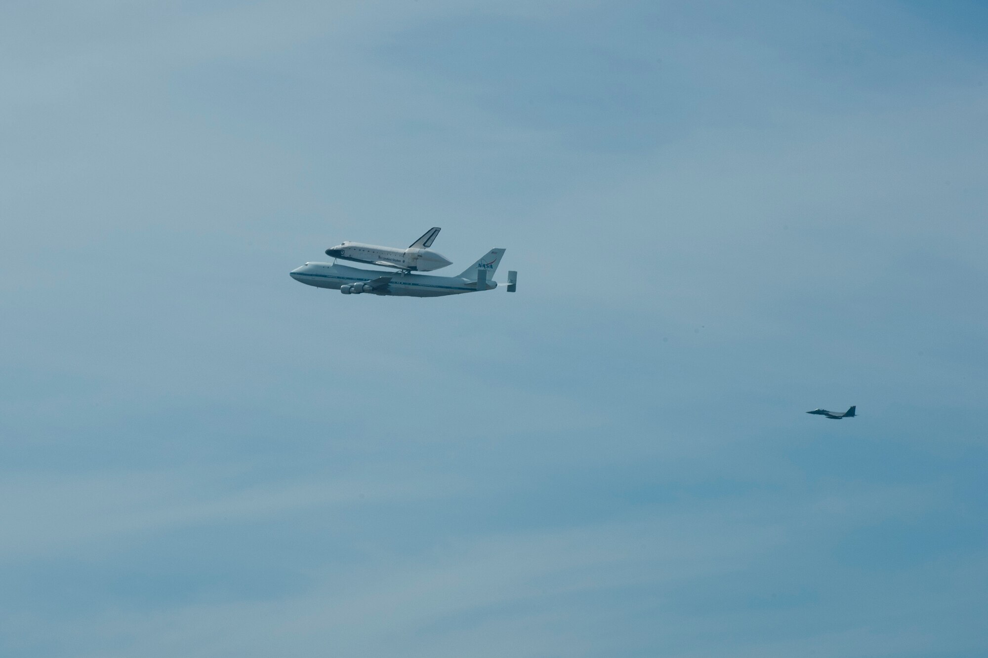 VANDENBERG AIR FORCE BASE, Calif. -- The space shuttle Endeavour flies over Vandenberg here Friday, Sept. 21, 2012. The Endeavour was the last shuttle to be built and its last mission was mission STS-134 in May 2011. (U.S. Air Force photo/Staff Sgt. Levi Riendeau)