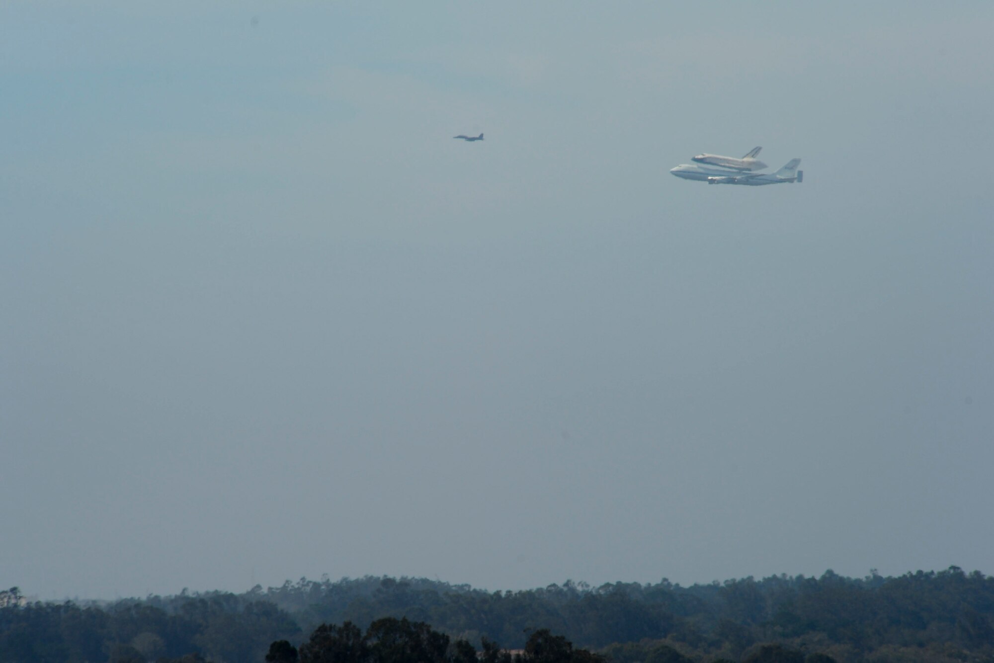 VANDENBERG AIR FORCE BASE, Calif. -- The space shuttle Endeavour flies over Vandenberg here Friday, Sept. 21, 2012. The Endeavour was the last shuttle to be built and its last mission was mission STS-134 in May 2011.  (U.S. Air Force photo/Chris Ghormley)