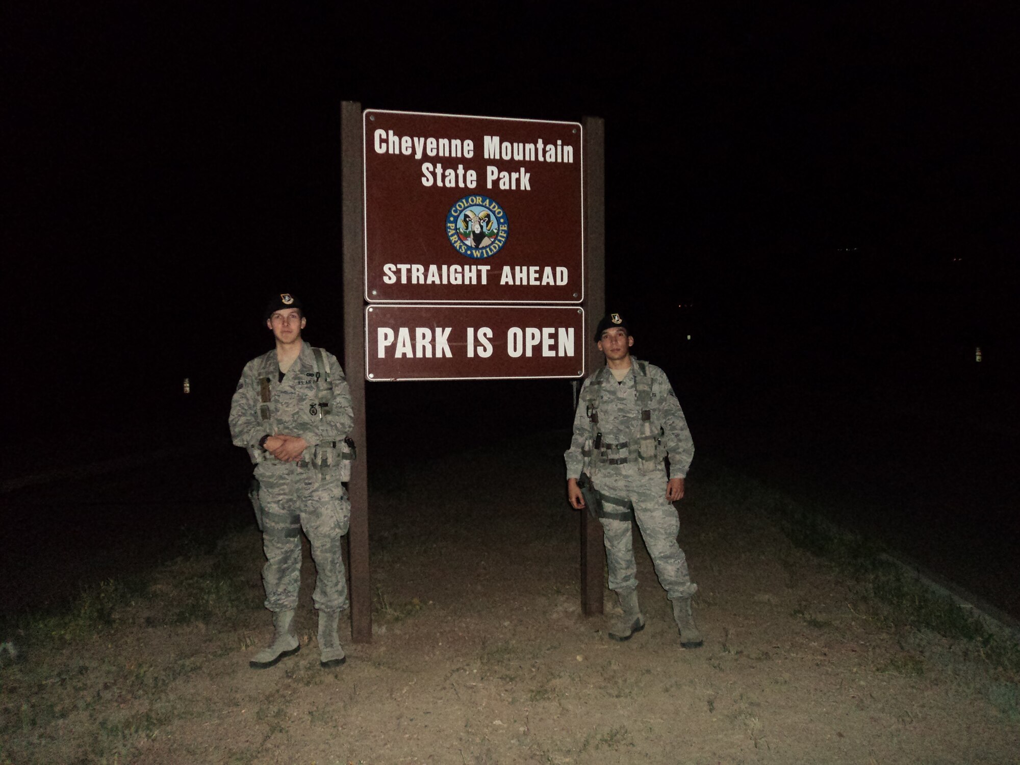 Senior Airmen Adam Rodgers (left) and Carlos Amaya, 721st Security Forces Squadron, patrol Cheyenne Mountain State Park during the Waldo Canyon fire. The 721st SFS Airmen are concerned not only with threats to the security and safety within the perimeter of the installation, but also the areas bordering the perimeter, called the base security zone. The threat of a wildfire breaking out in the state park, essentially the doorstep of CMAFS, was deemed high, leading to the patrols. (U.S. Air Force photo)