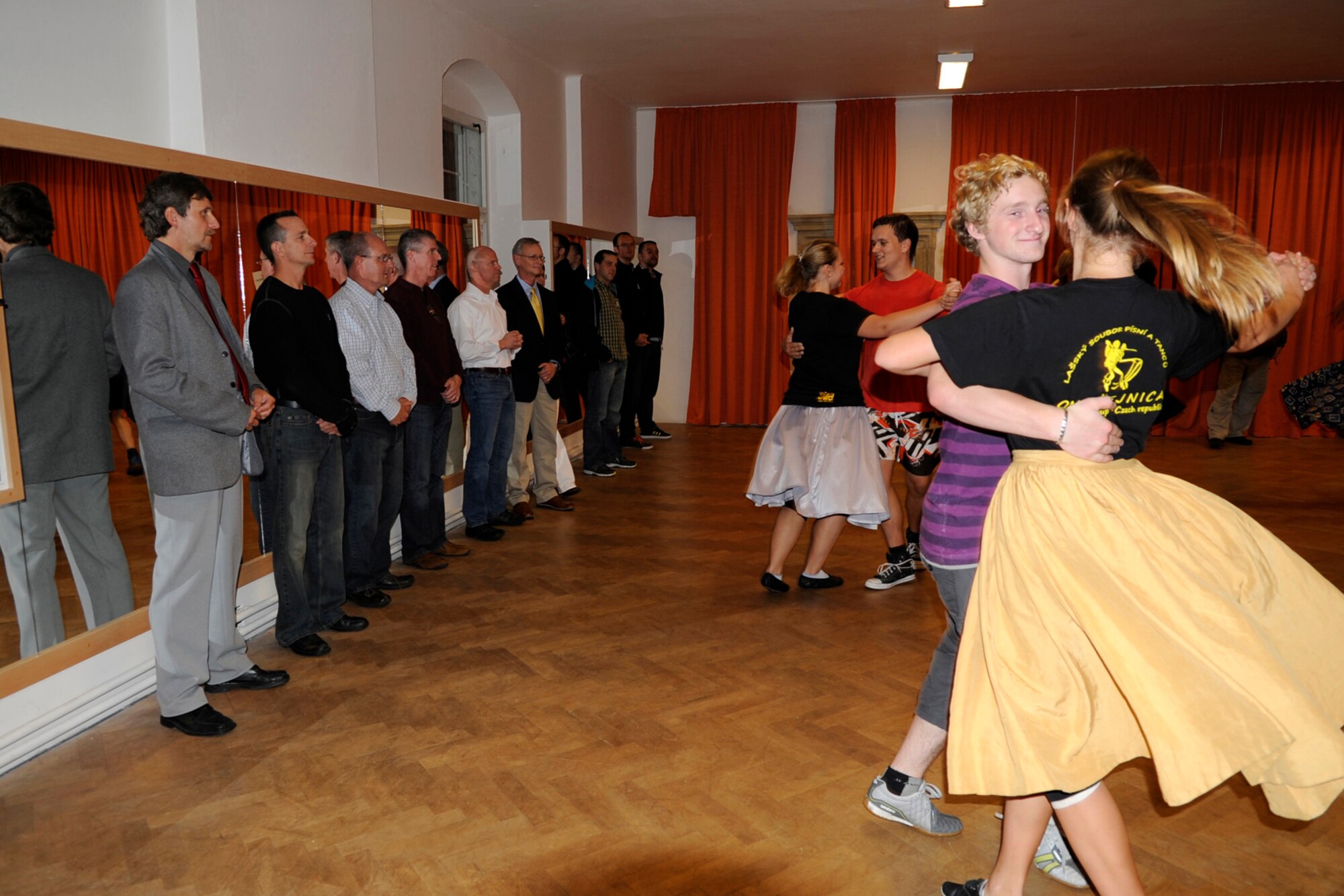 Members of the 307th Bomb Wing are given a demonstration of traditional folklore dancing at the Stara Ves Castle during a tour the village mayor gave to the group Sept. 19, 2012. The wing is participating in the NATO Days Air Show in Ostrava, Czech Republic, where they are displaying a B-52 Stratofortress Sept. 22-23. (U.S. Air Force photo by Senior Master Sgt. Jessica Daurizio/Released)