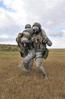 MINOT AIR FORCE BASE, N.D. – Senior Airman Isai Reyes, 91st Security Forces Group tactical response force team, fireman carries his wingman to safety during a training exercise here, Sept.6. Minot Airmen from both the 5th Bomb Wing and the 91st Missile Wing are participating in this year's Air Force Global Strike Command Global Strike Challenge during the months of June through November to showcase the world's premier bomber and ICBM forces and to recognize outstanding AFGSC personnel and teams.    (U.S. Air Force photo/Senior Airman Brittany Y. Auld)