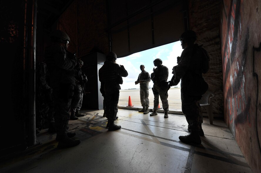 MINOT AIR FORCE BASE, N.D. – Master Sgt. Kyle Andino, 91st Security Forces Group tactical response force team, explains the next scenario to Airmen during training here, Sept. 6. Minot Airmen from both the 5th Bomb Wing and the 91st Missile Wing are participating in this year's Air Force Global Strike Command Global Strike Challenge during the months of June through November to showcase the world's premier bomber and ICBM forces and to recognize outstanding AFGSC personnel and teams.    (U.S. Air Force photo/Senior Airman Brittany Y. Auld))
