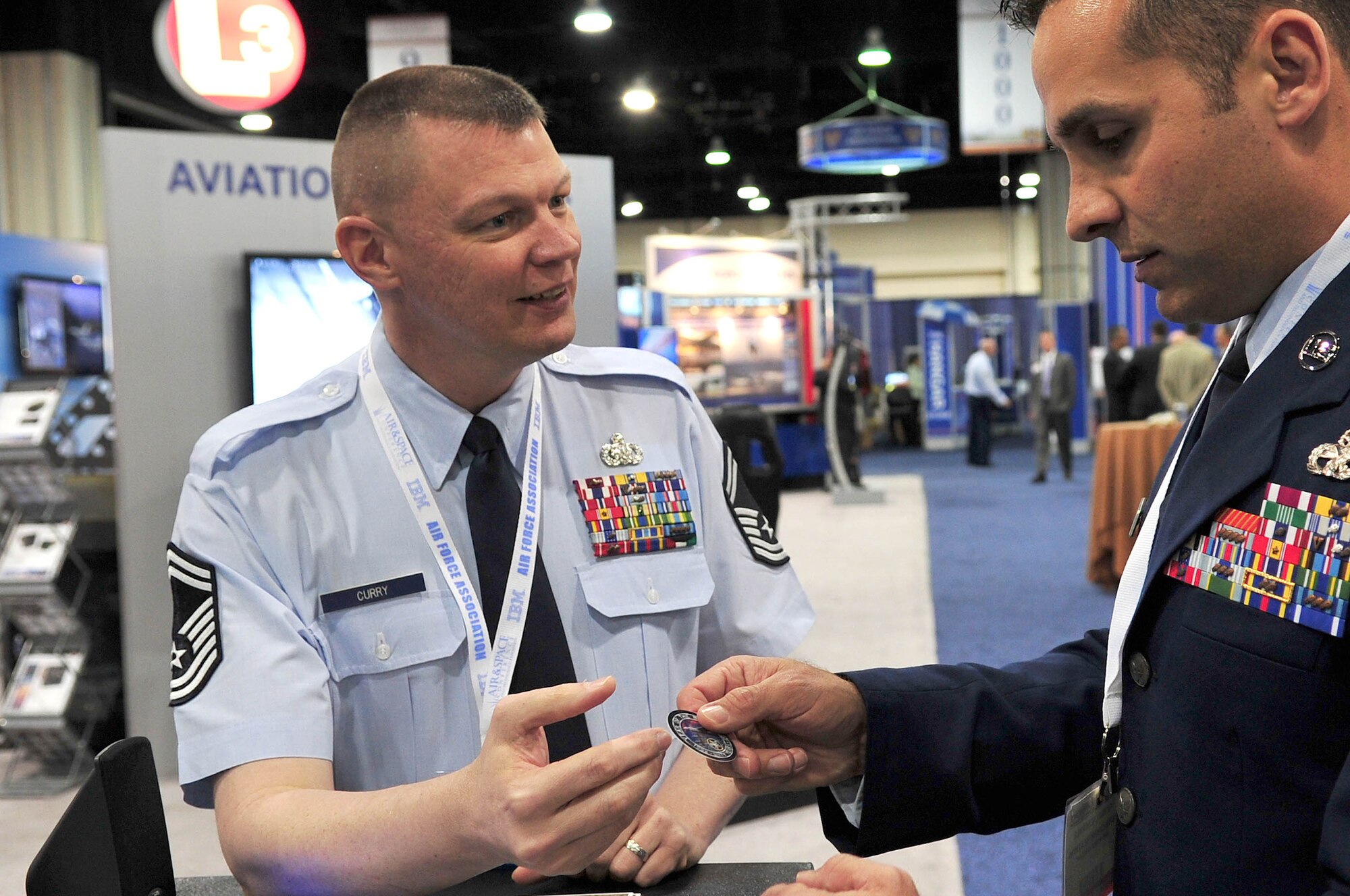 Senior Master Sgt. Michael Curry, Air Force Global Strike Command headquarters, Barksdale Air Force Base, La. speaks to Master Sgt Michael Schoenly, 844th Communications Group first sergeant, Joint Base Andrews, Md. during this year?s Air Force Association Air and Space Conference and Technology Exposition, Washington D.C., Sept. 17-19, 2012. Air Force Global Strike Command is commemorating the 60th anniversary of the first flight of the B-52 Stratofortress on April 15, 1952, with yearlong events centered around the theme: "The B-52: An Icon of American Airpower." AFGSC is responsible for the nation's three intercontinental ballistic missile wings, the two B-52 wings and the only B-2 wing. (U.S. Air Force photo by Senior Airman Steele C. G. Britton)