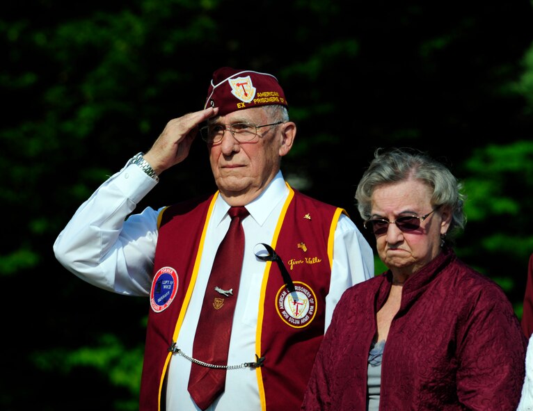 Former Prisoner of War, Senior Master Sgt. James Wells, renders a salute in honor of respect during the Sept. 17, 2012 POW/MIA remembrance ceremony at Memorial Grove Park, Joint Base Lewis-McChord, Wash. Wells served during three major conflicts to include World War II, Korean War and Vietnam War and was a POW during the World War II conflict. (U.S. Air Force photo/Master Sgt. Todd Wivell) 

