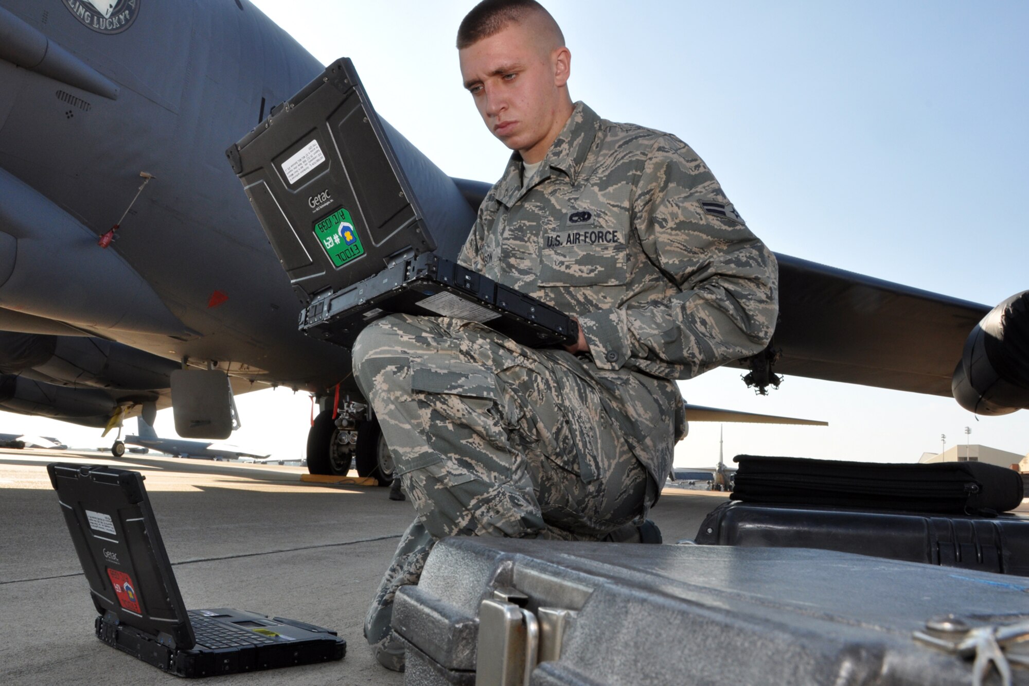 Airman 1st Class Jeff Wilson, a B-52 Stratofortress crew chief assigned to the 307th Aircraft Maintenance Squadron, checks to ensure it is safe for maintenance personnel get on a jet at Barksdale Air Force Base, La., Sept. 13, 2012. Wilson was participating in the crew chief Aircraft Preflight Inspection competition as part of the 2012 annual Global Strike Challenge at Barksdale. (U.S. Air Force photo by Master Sgt. Jeff Walston)   