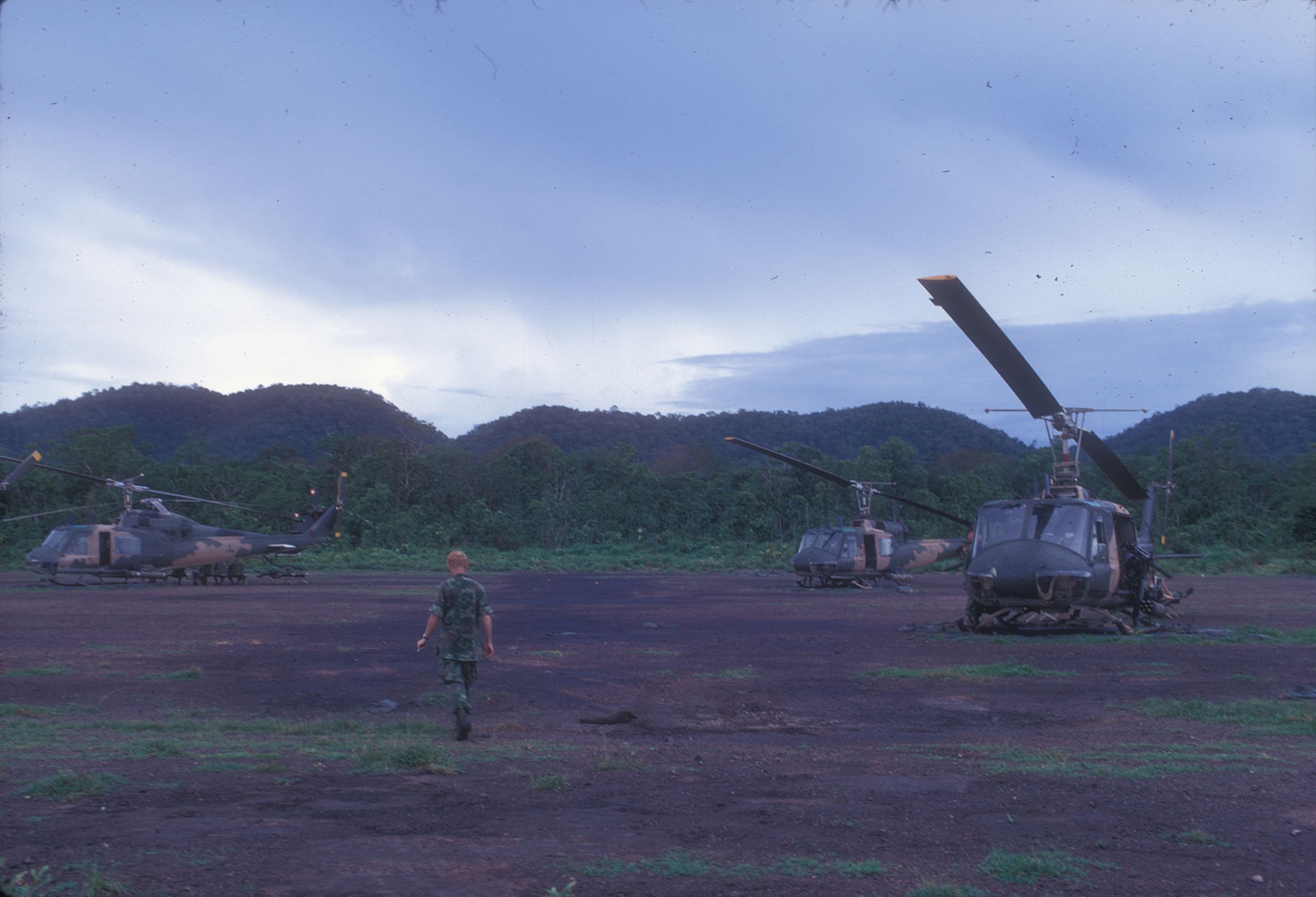 On alert at Ban Don, South Vietnam, in July 1970. From locations along the borders with Cambodia and Laos, the US Air Force helicopters covertly inserted reconnaissance teams, which included local peoples like the Hmong, along the Ho Chi Minh Trail. (U.S. Air Force photo)