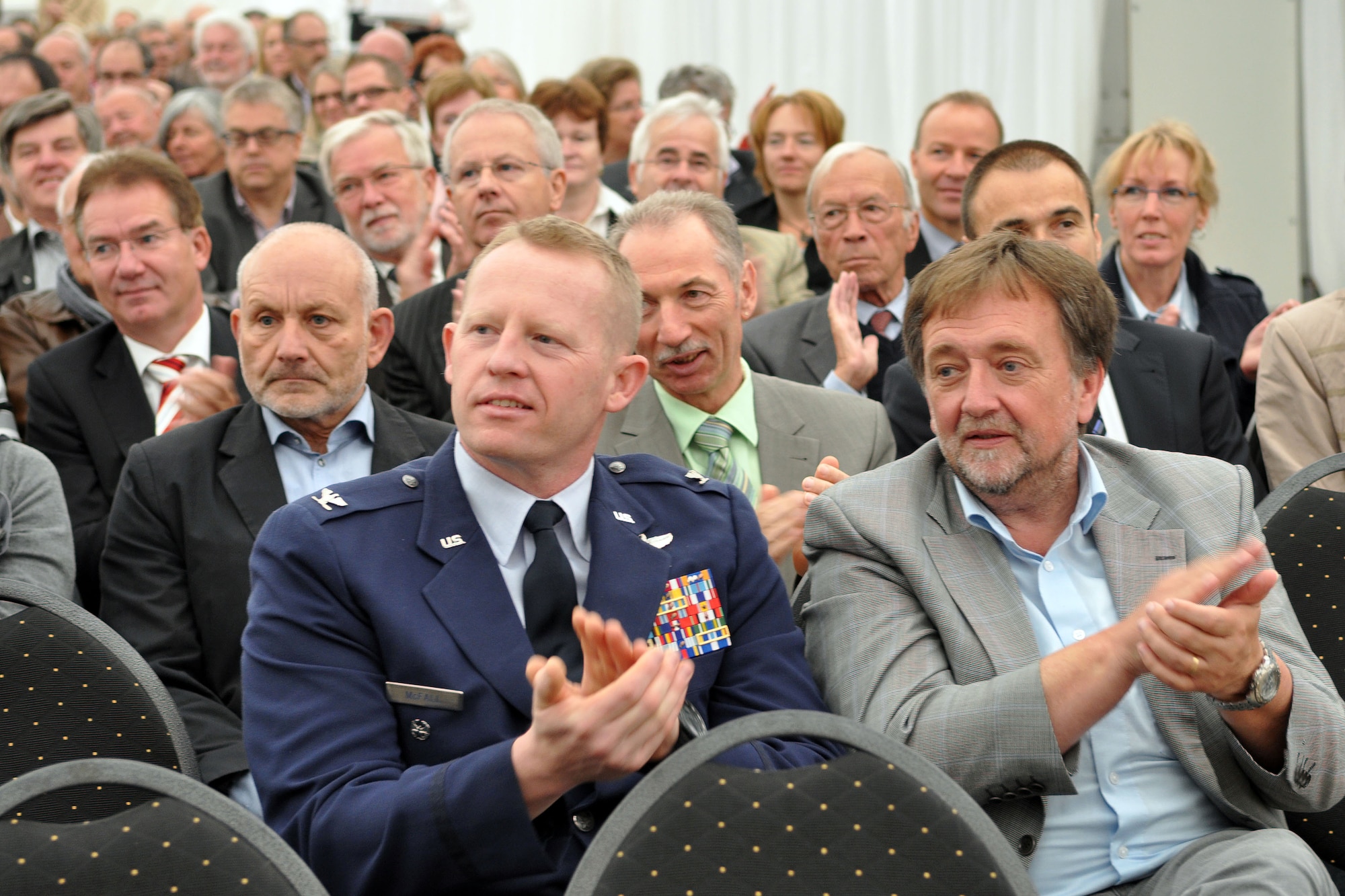 WITTLICH, Germany – Col. Joseph McFall, 52nd Fighter Wing vice commander, and Bernhard Schaefer, 52nd FW community relations advisor, were among the invited guests at the opening ceremonies of the 2012 Wittlich Commerce Fair Sept. 21 here. Joachim Rodenkirch, mayor of Wittlich, thanked guests and representatives from the political, economic and cultural arena for their attendance. The Wittlich mayor expressed his thanks to the commander and Spangdahlem Air Base for continuous support and engagement in the local community. (U.S. Air Force photo by Iris
Reiff/Released)