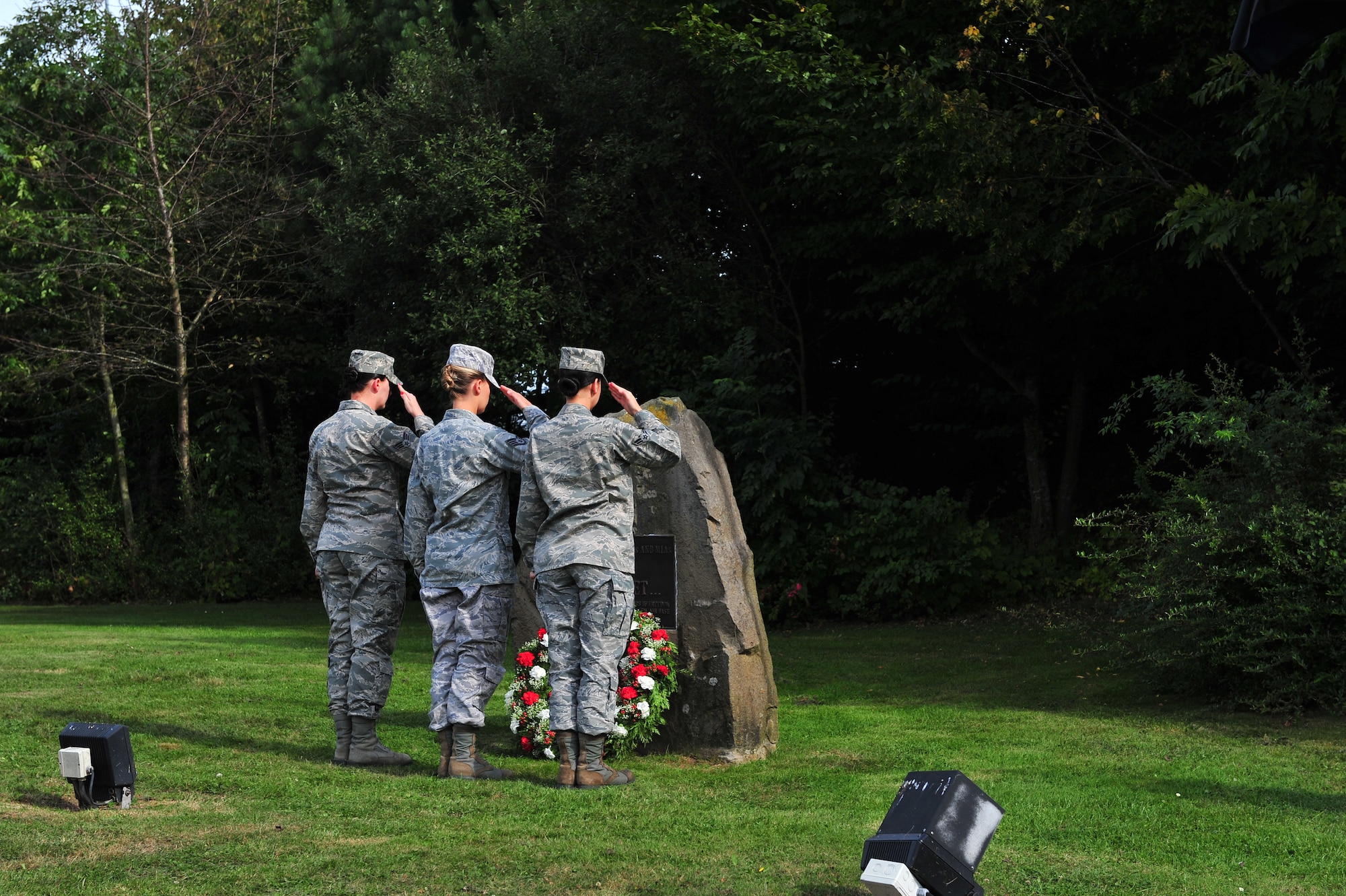 SPANGDAHLEM AIR BASE, Germany – Members of the 52nd Fighter Wing lay a wreath of honor during the Prisoner of War Missing in Action Ceremony at the air park here Sept. 21. The ceremony is held every year to remember those who have served and been taken prisoner or have been listed as MIA. (U.S. Air Force photo by Airman 1st Class Dillon Davis/Released)