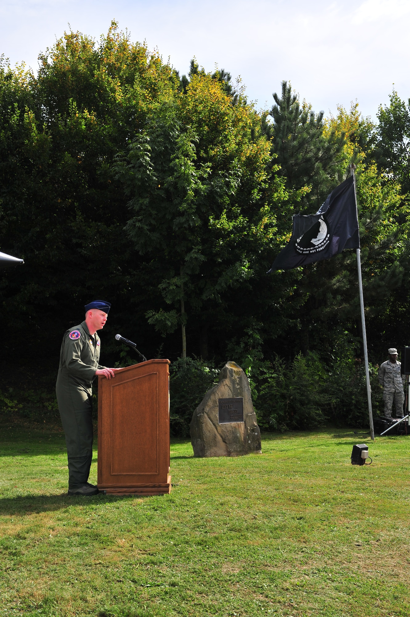 SPANGDAHLEM AIR BASE, Germany – Col. Joseph McFall, 52nd Fighter Wing vice commander, speaks to Airmen during the Prisoner of War Missing in Action Ceremony at the air park here Sept. 21. The ceremony is held every year to remember those who have served and been taken prisoner or have been listed as MIA. (U.S. Air Force photo by Airman 1st Class Dillon Davis/Released)