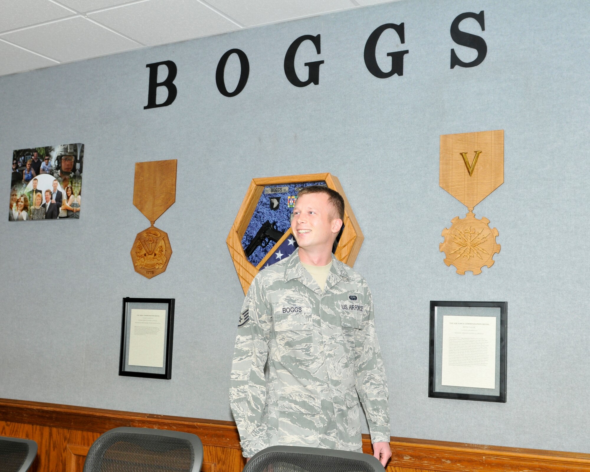 Staff Sgt. Daniel Boggs, a software developer and analyst for the 552nd Air Control Network Squadron at Tinker Air Force Base, tours a room at the NCO Academy at Tyndall AFB, Fla. that was dedicated on Sept. 5 in his honor. (Air Force photo by Susan Trahan)