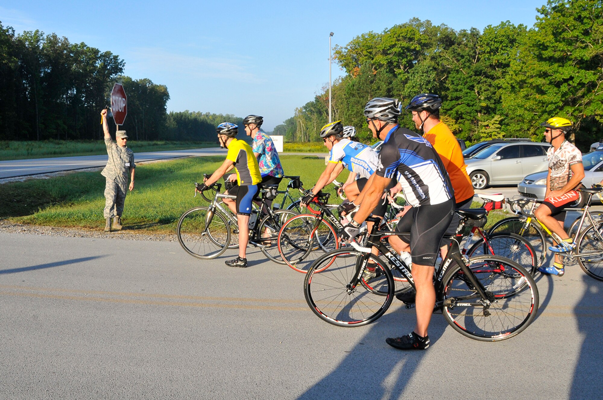 Arnold AFB Commander Col. Ray Toth fired the starting pistol for 19 cyclists who participated in the third annual bike-a-thon to honor the memory of Tech. Sgt. Gene Jobe, a 21-year career Air Force member and the late father-in-law of former AEDC chaplain, Maj. Paul Gunn. Many of the cyclists, all of whom work at the base’s Arnold Engineering Development Complex, have participated in all or most of the previous bike-a-thons since its inception in 2009. (Photo by Jacqueline Cowan)