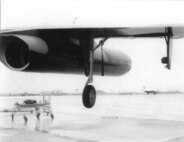 Photograph taken at Da Nang Air Base in South Vietnam showing the damage done to the B-52's left drop tank. (U.S. Air Force photo)