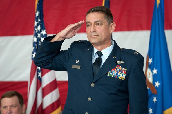 Col. Warren H. Hurst receives his first salute as commander of the 123rd Airlift Wing during a change-of-command ceremony held in the Fuel Cell Hangar at the Kentucky Air National Guard Base in Louisville, Ky., on Sept. 16, 2012. Hurst replaces Col. Greg Nelson, who has been named deputy director of strategic plans and policy at the National Guard Bureau in Washington, D.C. (U.S. Air Force photo by Senior Airman Maxwell Rechel)