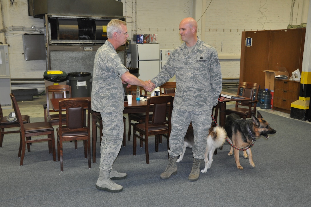 General Kodlick made a surprise visit to the USAFE Band to recognize TSgt Jason Cale's original song titled "Jump In."  His music has increased morale on base and continues to inspire audiences worldwide.