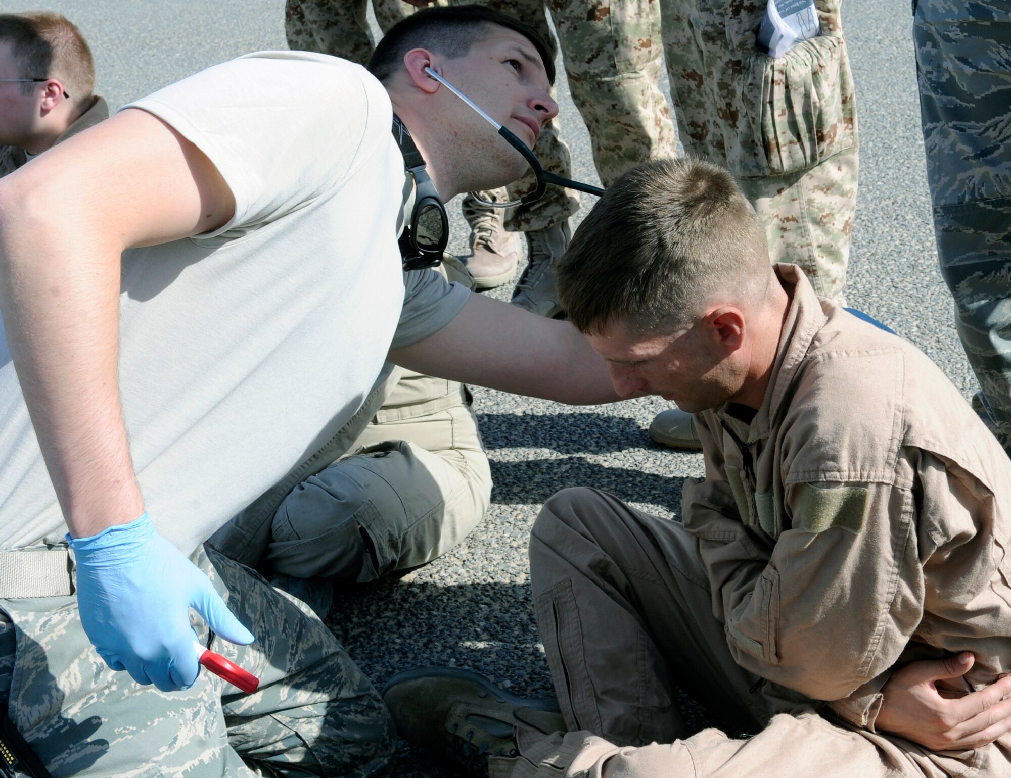 SOUTHWEST ASIA – A member of the 386th Expeditionary Medical Group performs vital checks on a simulated victim during the major accident response exercise here Sept. 18. Training and education are the keys to ensuring the installation is prepared for any type of major accident response in the future.  (U.S. Air Force photo/Staff Sgt. Alexandra M. Boutte)