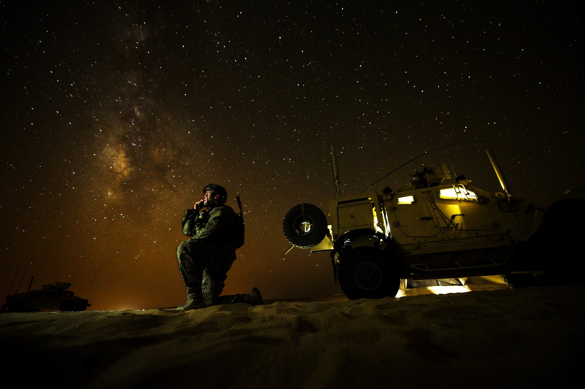 1st Lt. Drew Parks, Air Liaison Officer, 82nd Expeditionary Air Support Operations Squadron, communicates with a U.S. Navy F/A-18 Super Hornet supporting Operation Spartan Shield on Sept. 11, 2012, Southwest Asia. JTAC's establish and maintain command and control communications, control air traffic, naval gun fire, and provide precision terminal attack guidance of U.S. and coalition close air support. Parks hometown is Hampstead, N.C. (U.S. Air Force photo/ Staff Sgt. Jonathan Snyder)  