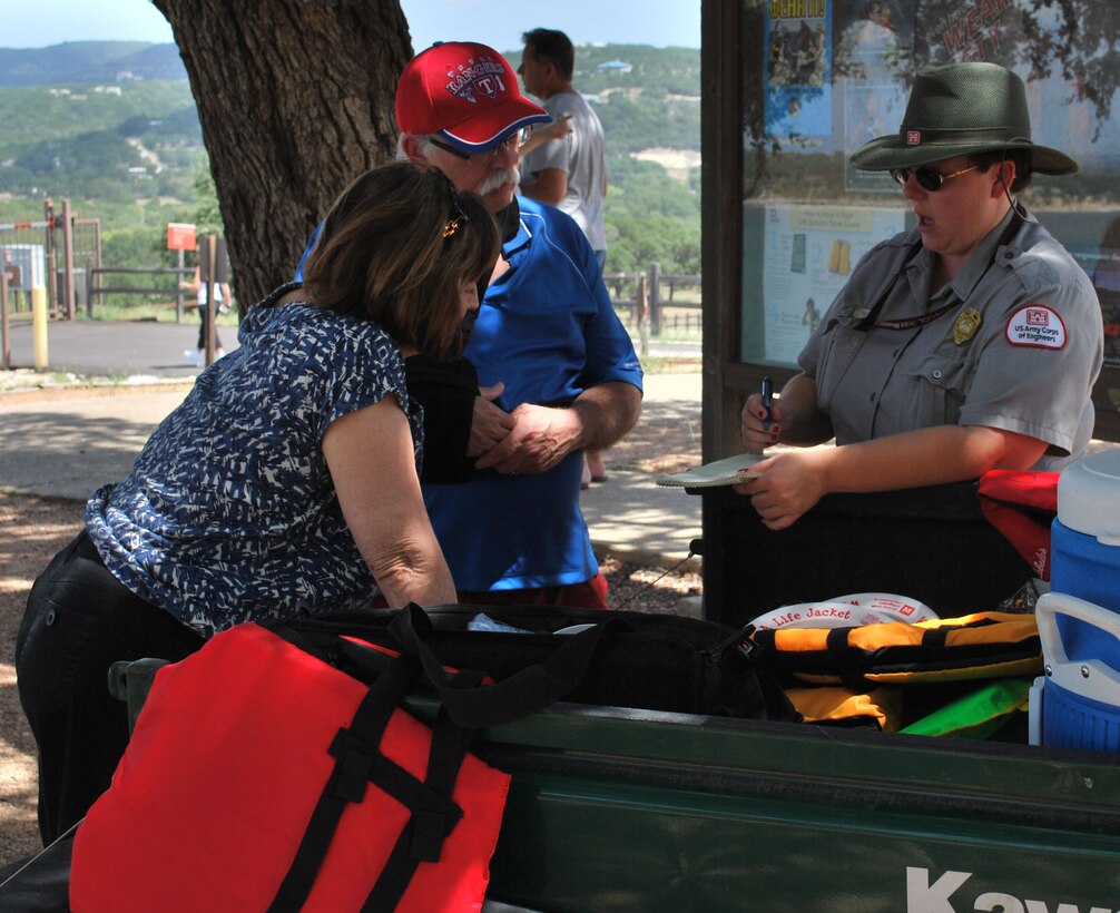 Terri Beth Teaschner, Natural Resources Specialist at Canyon Lake gives visitors directions on how to get to various areas of the lake.