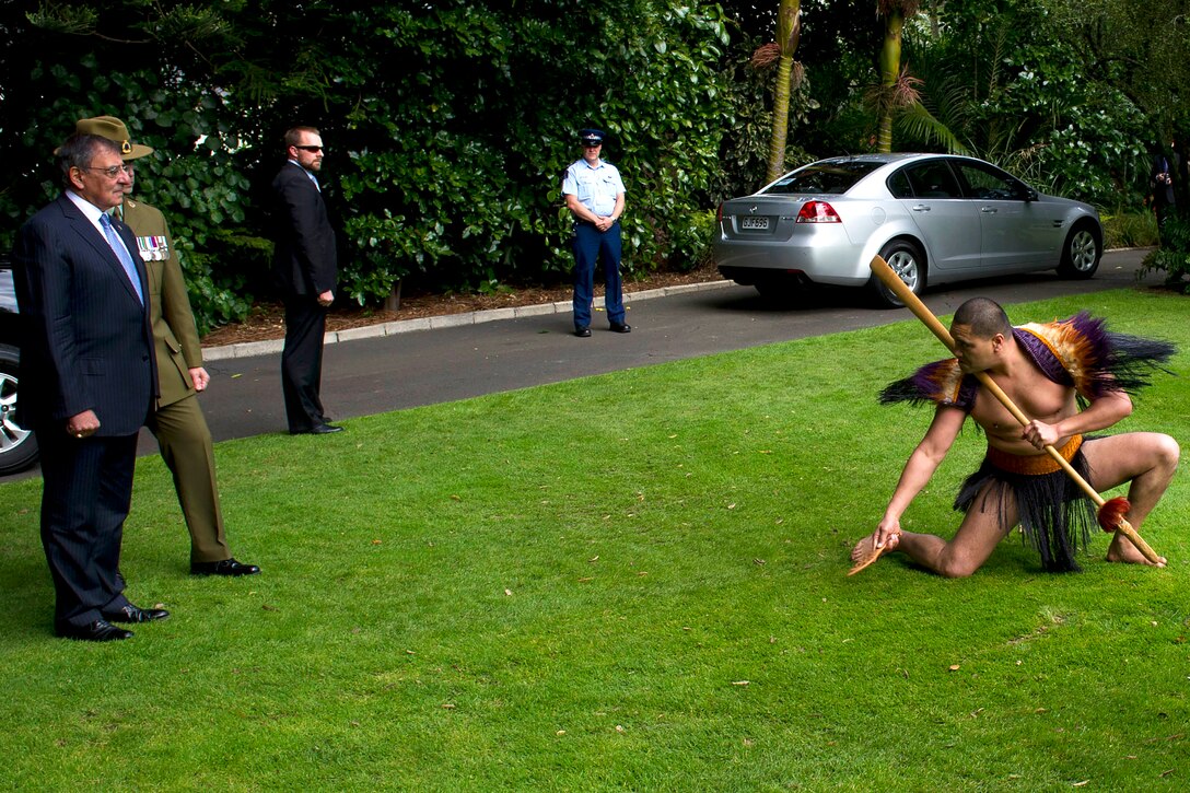 U.S. Defense Secretary Leon E. Panetta watches as a Maori warrior issues a wero, or challenge, during a Powhiri ceremony while visiting Auckland, New Zealand, Sept. 21, 2012. Panetta picked up the rakau tapu, or dart, that the warrior placed at his feet, while keeping eye contact with the warrior. The ceremony  is an ancient Maori tradition used to determine if visitors came in peace or with hostile intent. 