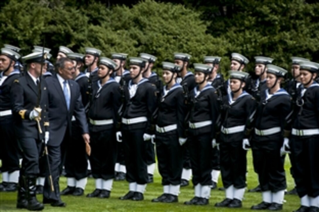 U.S. Defense Secretary Leon E. Panetta inspects the honor guard in Auckland, New Zealand, Sept. 21, 2012. Panetta visited Tokyo and Beijing before traveling to Auckland to conclude a weeklong trip to the Asia-Pacific region.
