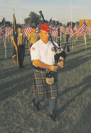 A bagpiper performs a tune during the Patriots' Field of Flags, a ceremony hosted by American Legion Post 30 of Albany, Ga.

