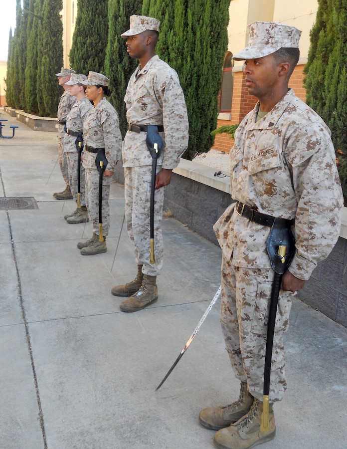 Cpl. Alfonso Jarrett Jr., a Philadelphia native and reservist with 4th Maintenance Battalion, Electronic Equipment Maintenance Company, Detachment 1 in Greensboro, S.C., practices sword manual along with other Corporal's Course Marines, Aug. 23, 2012. Marines from Special-Purpose Marine Air-Ground Task Force Africa and the 24th Marine Expeditionary Unit's Joint Task Force Enabler participated in a three-week Corporal's Course on Naval Air Station Sigonella, Sicily, Aug. 13-30. The course provides the Marines with necessary leadership skills and is designed to provide the war fighting skills, core values and mindset necessary for effective leadership of Marines.