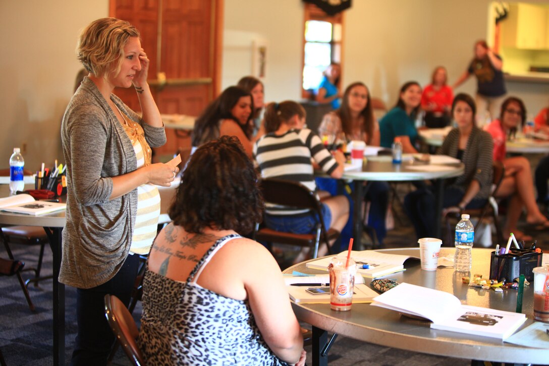 Michelle Luttrell, whose husband is a Marine with Combat Logistics Regiment 2, 2nd Marine Logistics Group, shares some of the information she learned about her fellow spouses during a Lifestyles, Insights, Networking, Knowledge and Skills class aboard Camp Lejeune, N.C., Sept. 17, 2012. The L.I.N.K.S. training helps spouses understand how the Marine Corps operates and how they can adapt to some of the unique challenges of being a Marine spouse.