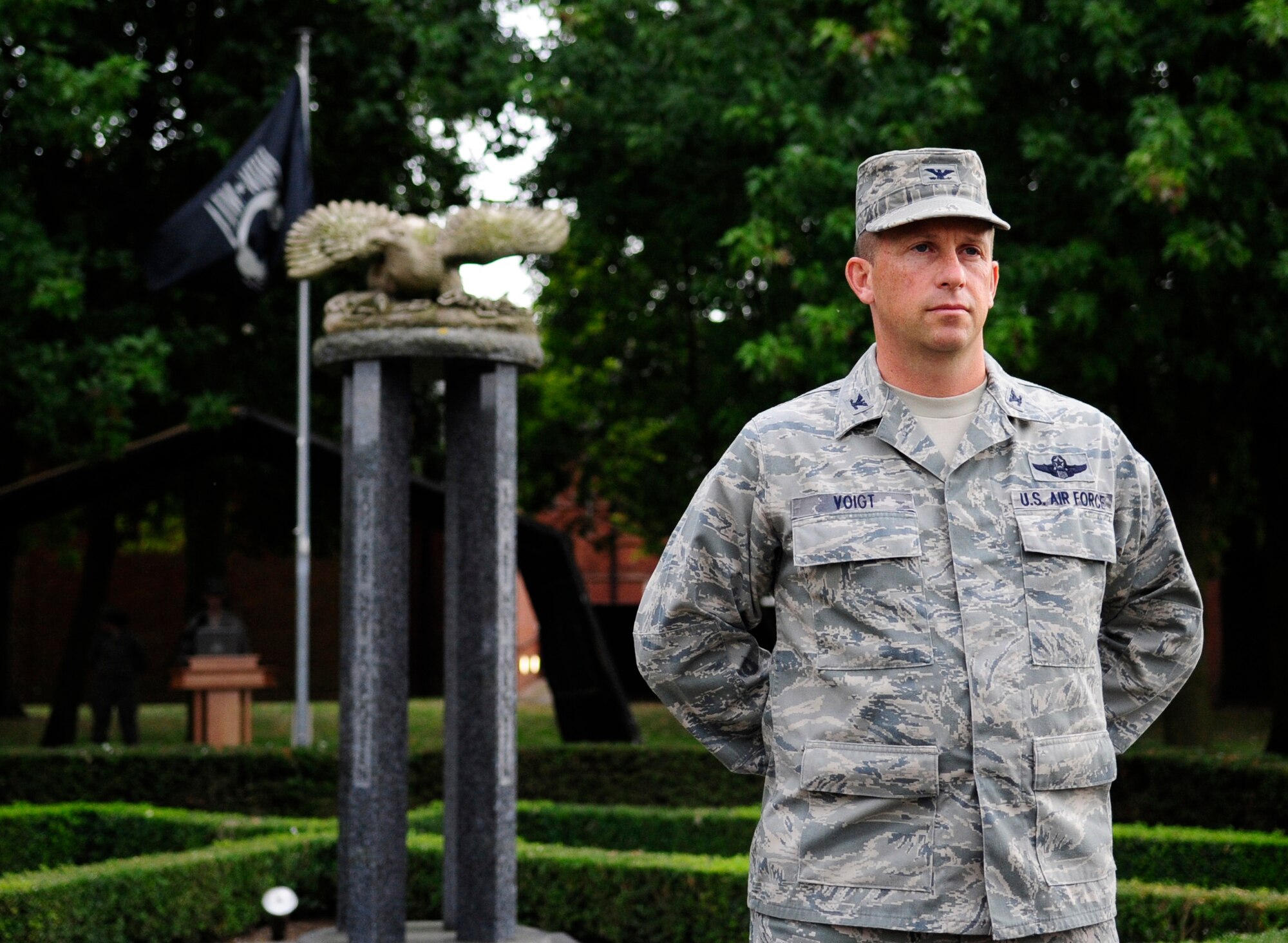 RAF MILDENHALL, England – Col. Kyle Voigt, 100th Air Refueling Wing vice commander, stands at parade rest in front of the Prisoner of War/Missing in Action memorial while participating in a 24-hour vigil Sept. 20, 2012 at RAF Mildenhall. The base hosts the vigil as part of the annual POW/MIA Remembrance Week. (U.S. Air Force photo/Senior Airman Ethan Morgan)