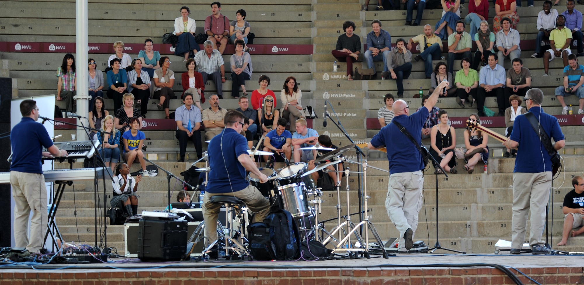 VANDERBIJLPARK, South Africa -- U.S. Air Forces in Europe rock band, Touch 'n Go, performs during a show for students and instructors at Northern University here, Sept. 19. The band, Touch 'n Go, has made three performances in local communities across South Africa and will be performing at the Africa Aerospace and Defense Exposition Sept. 22-23 at 10 a.m. and 2 p.m. on both days. The band is committed to fortifying international relationships, fostering trust and friendships, and enhancing troop morale. (U.S. Air Force photo by Staff Sgt. Benjamin Wilson)