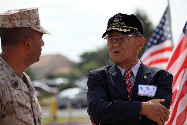 Master Sgt. Ruben Urquidez, the operations and training chief for Marine Corps Base Operations, speaks with Yong Lim Lee, a Republic of Korea?s veteran, at the 62nd Memorial Anniversary of the Korean War at Camp Pendleton?s Pacific Views Event Center, Sept. 22. The event was held to honor the veterans who fought during the Landing on Inchon, in the street of Seoul and in the northern mountains near the Chosen Reservoir.