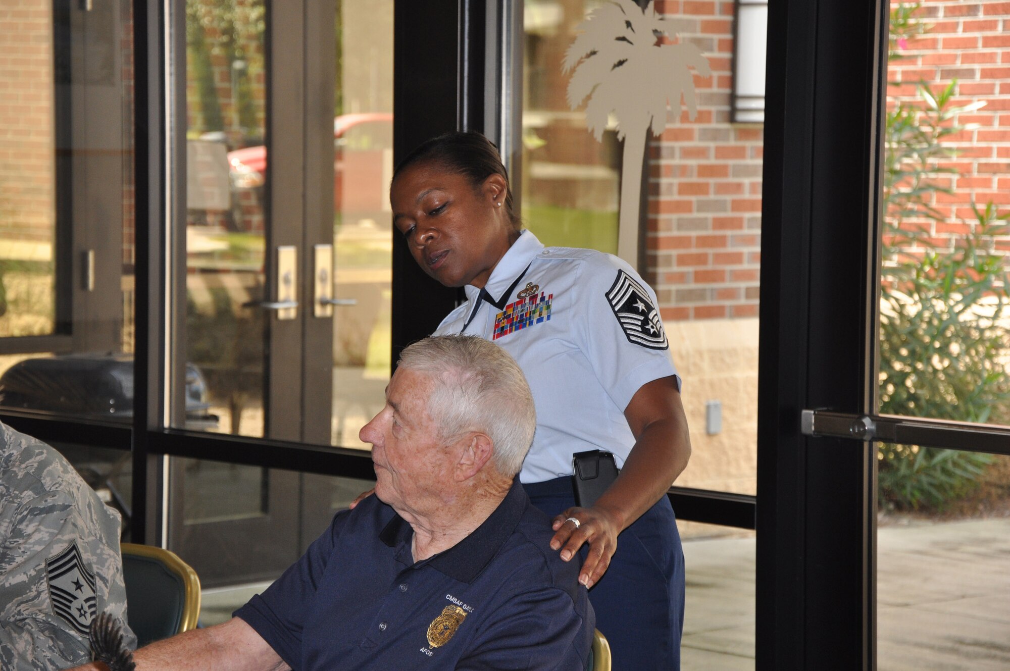 Retired Chief Master Sergeant Robert D. Gaylor, the fifth Chief Master Sergeant of the Air Force from 1977 to 1979, visits with airmen assigned to the 315th Airlift Wing Saturday, Sept. 22, 2012 at Joint Base Charleston, S.C. Chief Master Sergeant Gigi Manning, command chief 315 AW, introduces CMSgt. Gaylor during a one-on-one luncheon with fellow airmen. CMSgt. Gaylor discusses his service experiences and the many changes that took place under his leadership, while providing guidance and advice to the enlisted force.  (U.S. Air Force photo by Senior Airman Bobby Pilch)