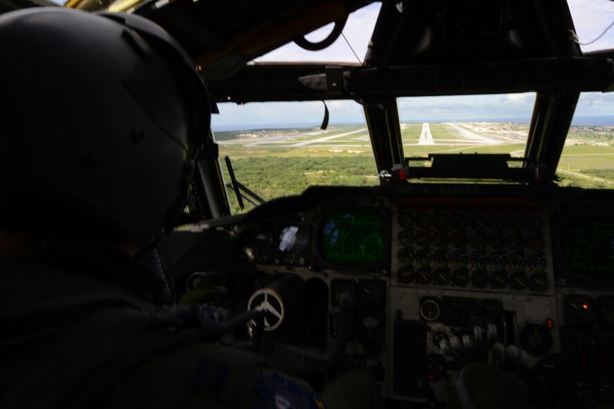 ANDERSEN AIR FORCE BASE, Guam - A pilot of the 69th Expeditionary Bomber Squadron is on final approach into Andersen Air Force Base, after returning from Valiant Shield 2012, on Sept 12. The B-52 has just participated in a SINKEX which consisted of sinking the decommissioned USS Coronado in the Western Pacific. (U.S. Air Force photo by Senior Airman Carlin
Leslie/Released)
