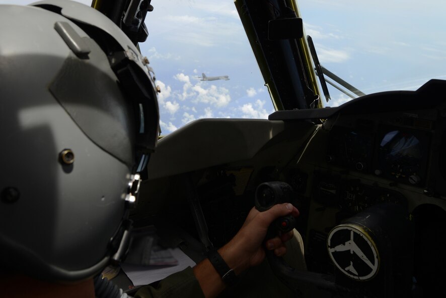 ANDERSEN AIR FORCE BASE, Guam - A pilot of the 69th Expeditionary Bomber Squadron forms up with another B-52 Stratofortress from the 69th EBS for a live-fire exercise during Valiant Shield 2012, on Sept 12. The exercise consisted of targeting and live firing practice against a surface target and enhancing combat readiness of deployed units. (U.S. Air Force photo by Senior Airman Carlin Leslie/Released)