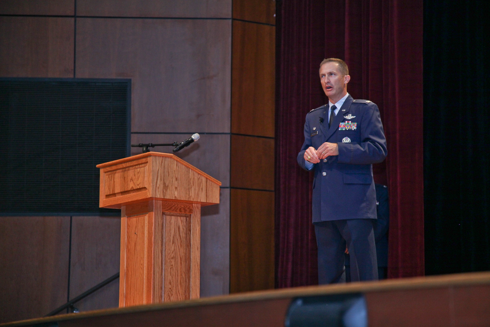New 315th Airlift Wing commander Col. James Fontanella addresses the wing Saturday Sept. 22, 2012, during an assumption of command ceremony at the Joint Base Charleston, S.C. base theatre. U.S. Air Force photo by Staff Sgt. Rashard Coaxum.
