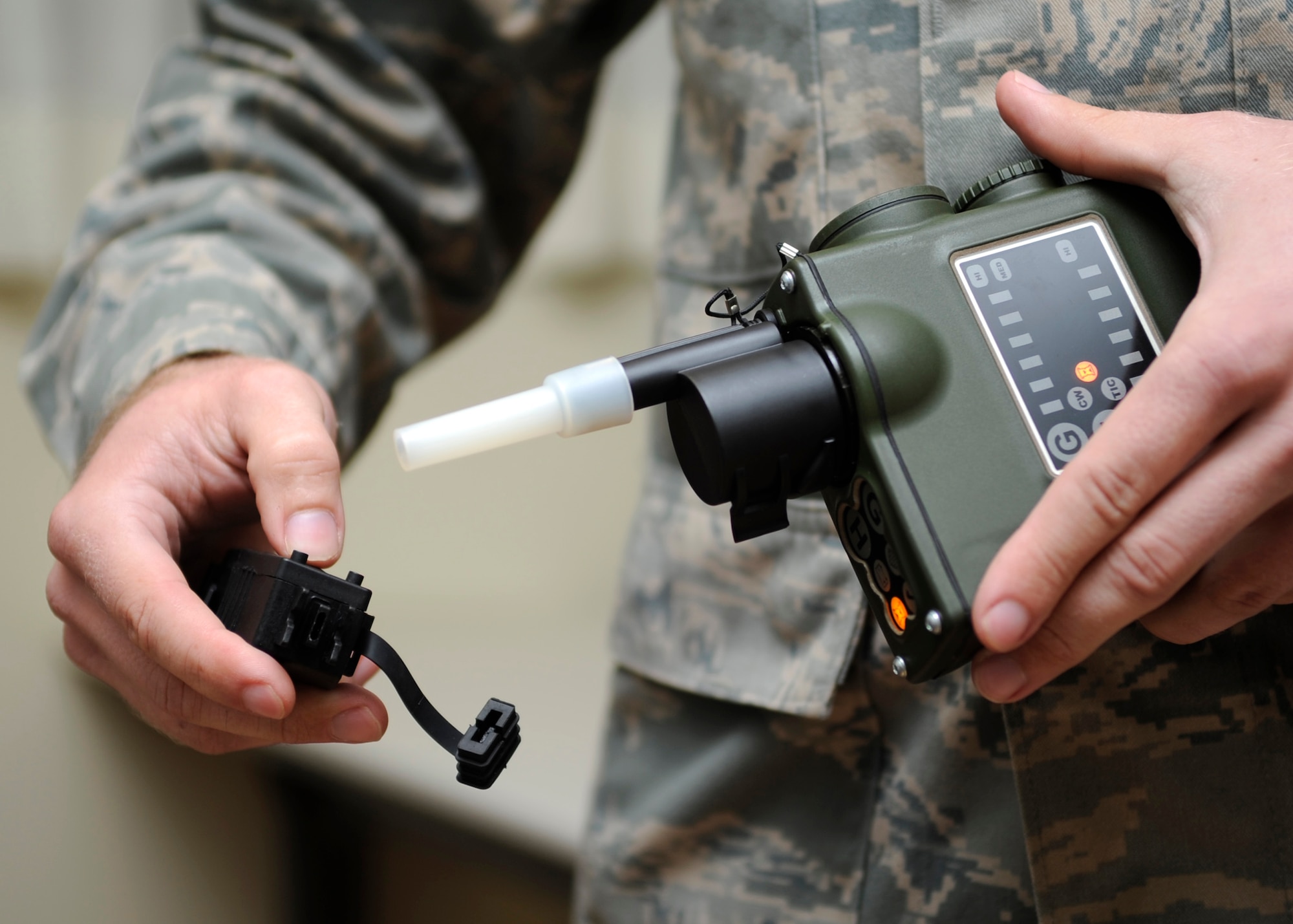 Senior Airman John Gaylord, 8th Civil Engineer Squadron emergency management journeyman, demonstrates how to use a joint chemical agent detector Sept. 24, 2012, at Kunsan Air Base, Republic of Korea. The JCADs are used to identify the strength and type of a contaminant. (U.S. Air Force photo/Senior Airman Brigitte N. Brantley)