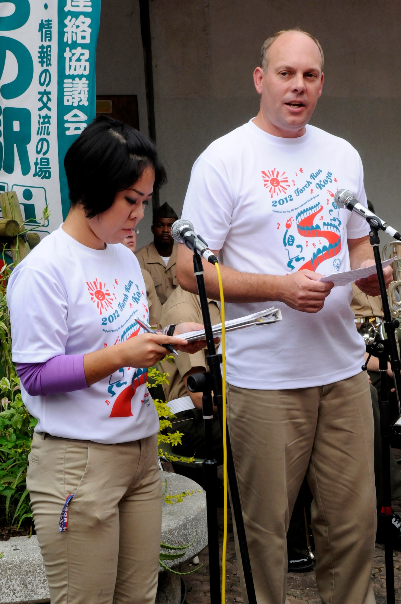 U.S. Air Force Col. Jeffrey Ullmann, 18th Mission Support Group commander, talks about the importance of support and partnership between U.S. service members island-wide and the local community during the 2012 Special Olympics Nippon Torch Run in Okinawa City, Japan, Sept. 22, 2012. (U.S. Air Force photo/Airman Tara A. Williamson)