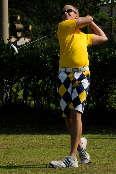 Capt. Daryl Mccoy , 8th Aircraft Maintenance Squadron, maintenance officer, competes in the Kunsan Olympics golf tournament at Kunsan Air Base, Republic of Korea, Sept. 20, 2012. The games were designed to strengthen the camaraderie of ROKAF and United States Air Forces while allowing friendly competition.  (U.S. Air Force photo/Senior Airman Marcus Morris)
