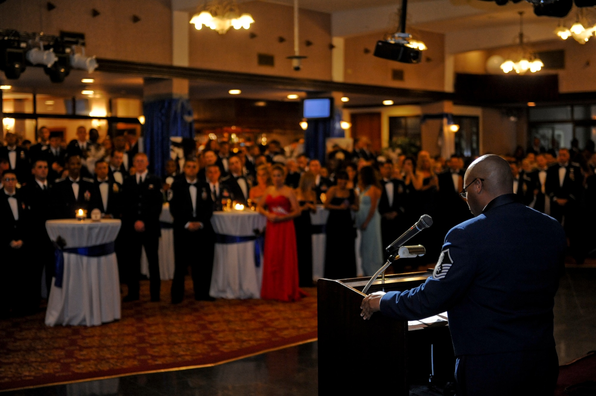 U.S. Air Force Master Sgt. Daniel Thompson, 390th Intelligence Squadron superintendent, talks to guests at the Air Force Ball on Kadena Air Base, Japan, Sept. 22, 2012. The ball is an annual Air Force-wide tradition to celebrate the heritage and history of the Air Force. (U.S. Air Force photo/Airman 1st Class Justin Veazie)