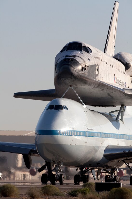 Space Shuttle Endeavor departs Edwards AFB for the final time before being flown to it's final destination in a Southern California museum. U.S. Air Force photo/Bobbi Zapka