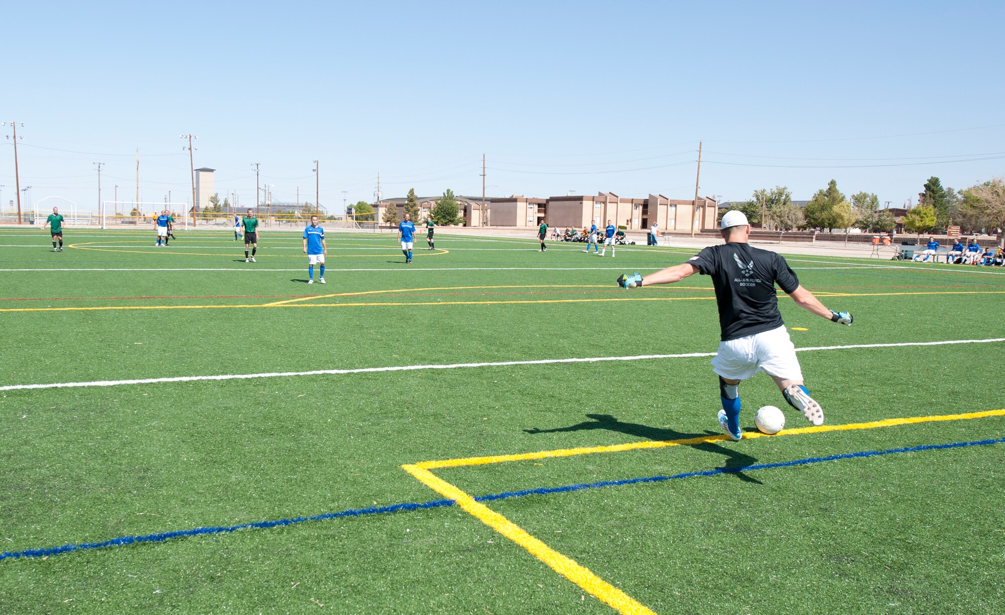 Dr. (Capt.) Douglas Grabowski, 49th Aeromedical Squadron advanced clinical dentist, takes a goal kick for the U.S. Air Force Holloman AFB soccer team during the 3rd annual Oktobercup Sept. 22, at the Holloman Air Force Base, N.M., soccer complex. The international soccer game between the U.S. Air Force Holloman AFB team and GAF was an opening event to the Oktoberfest activities which ensued later that evening. The GAF won the game 4 to 0. (U.S. Air Force photo by Airman 1st Class Colin Cates/Released)