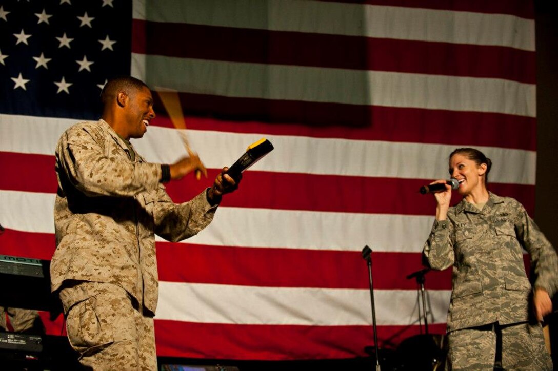 Chief Petty Officer Fred Turner rockin' the cowbell at the Transit Center at Manas, Kyrgyzstan, Sept. 21, 2012. (U.S. Air Force photo/Senior Airman Brett Clashman)