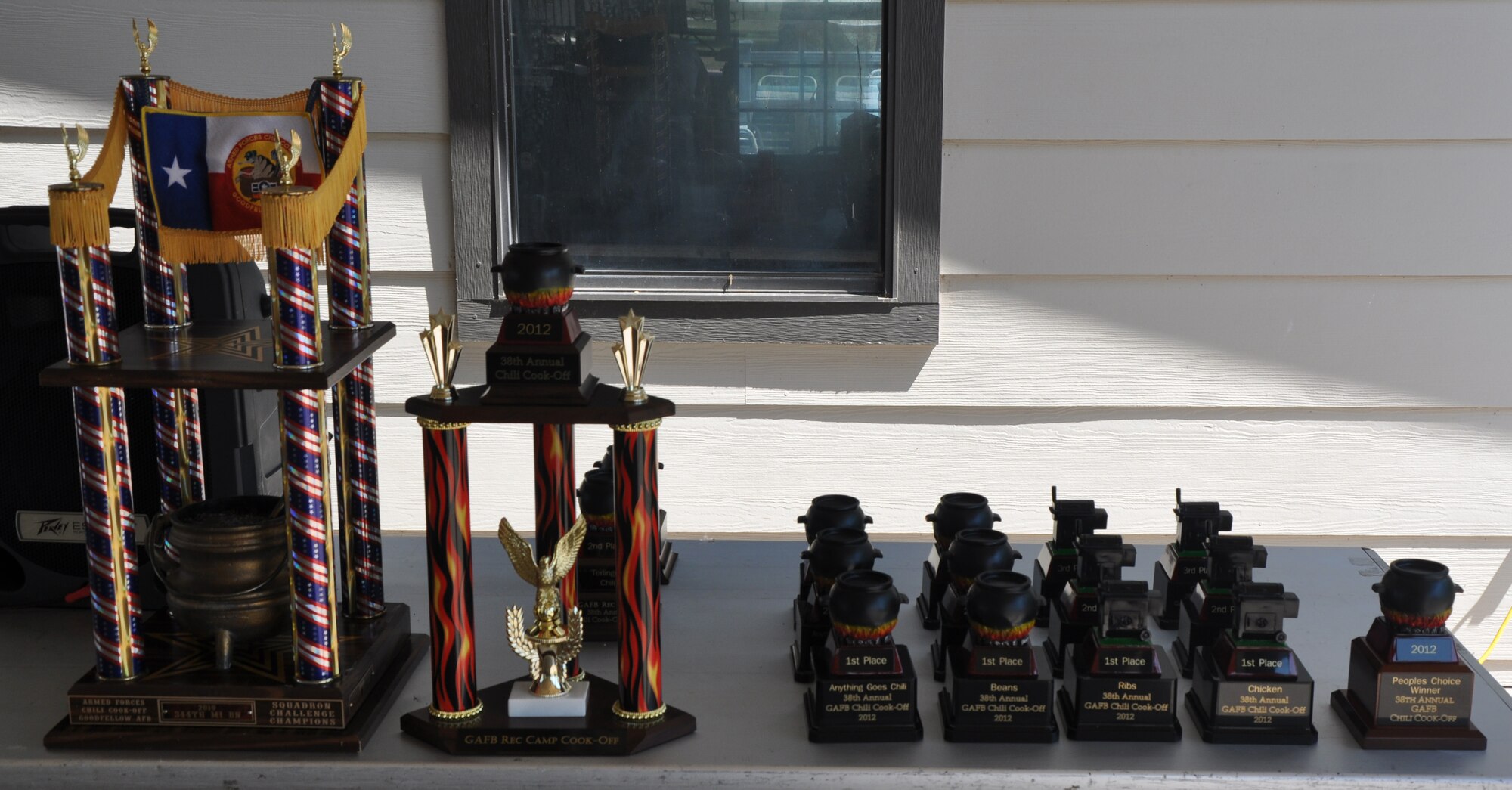 SAN ANGELO, Texas--Trophies presented to the winners of the Annual Chili Cook-Off sit on display at the Goodfellow Air Force Base Recreation Camp., Sept. 22. The winners received trophies in various categories such as beans, chicken, ribs, Terlingua chili or anything goes chili, as well as a people’s choice award. (U.S. Air Force photo by Airman 1st Class Joshua Edwards/Released) 