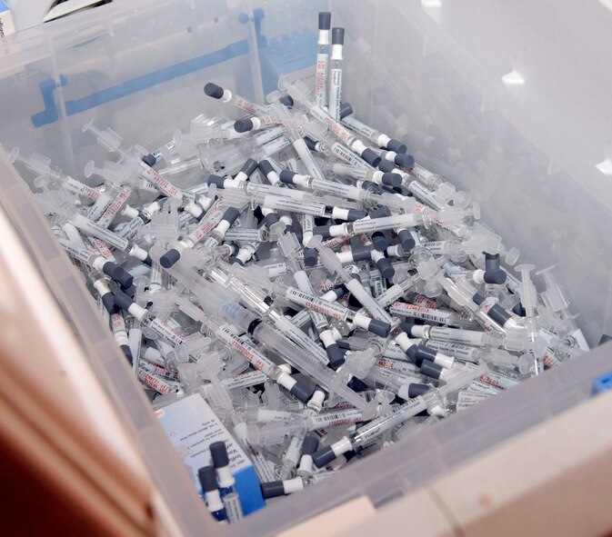 Flu vaccines wait to be administered on Barksdale Air Force Base, La., Sept. 24. The clinic is administering the first wave of flu vaccines Sept. 24 and 25 and a second wave Oct. 2-4 and a final wave Oct. 9-11 to ensure all of Team Barksdale is vaccinated to ensure mission readiness. (U.S. Air Force photo/Airman 1st Class Andrew Moua)(RELEASED)