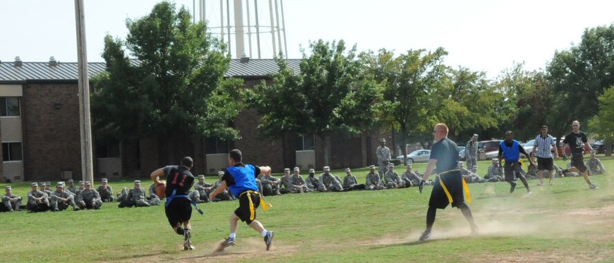 The third annual "Instructor versus Airman-In Training" Combined Federal Campaign flag football game kicked off at 4 P.M. at the Levitow field on Sept. 21. (U.S. Air Force Photo/Kimberly Dagdag)