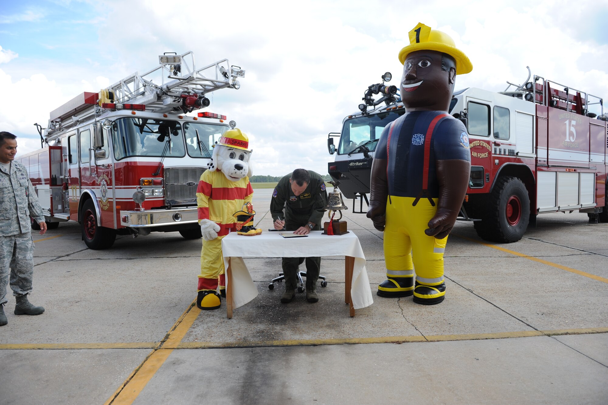 U.S. Air Force Col. Billy Thompson, 23d Wing commander, signs the 2012 Fire Prevention Week Proclamation at Moody Air Force Base, Ga., Sept. 21, 2012. Fire Prevention Week at Moody will be observed Oct. 7 to 13, and its goal is to increase awareness of preventing fires. (U.S. Air Force photo by Senior Airman Douglas Ellis/Released)
