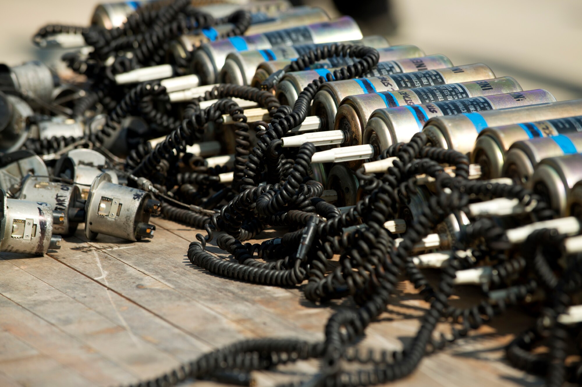 Bomb fuses and initiators sit ready to be installed in 500 pound general purpose bombs as part of the bomb build competition during the Global Strike Challenge, Sept. 13, 2012, Barksdale Air Force Base, La. Munitions technicians assigned to the 307th Maintenance Squadron at Barksdale competed in the timed event and were evaluated on correct safety and technical procedures. (U.S. Air Force photo by Master Sgt. Greg Steele/Released)